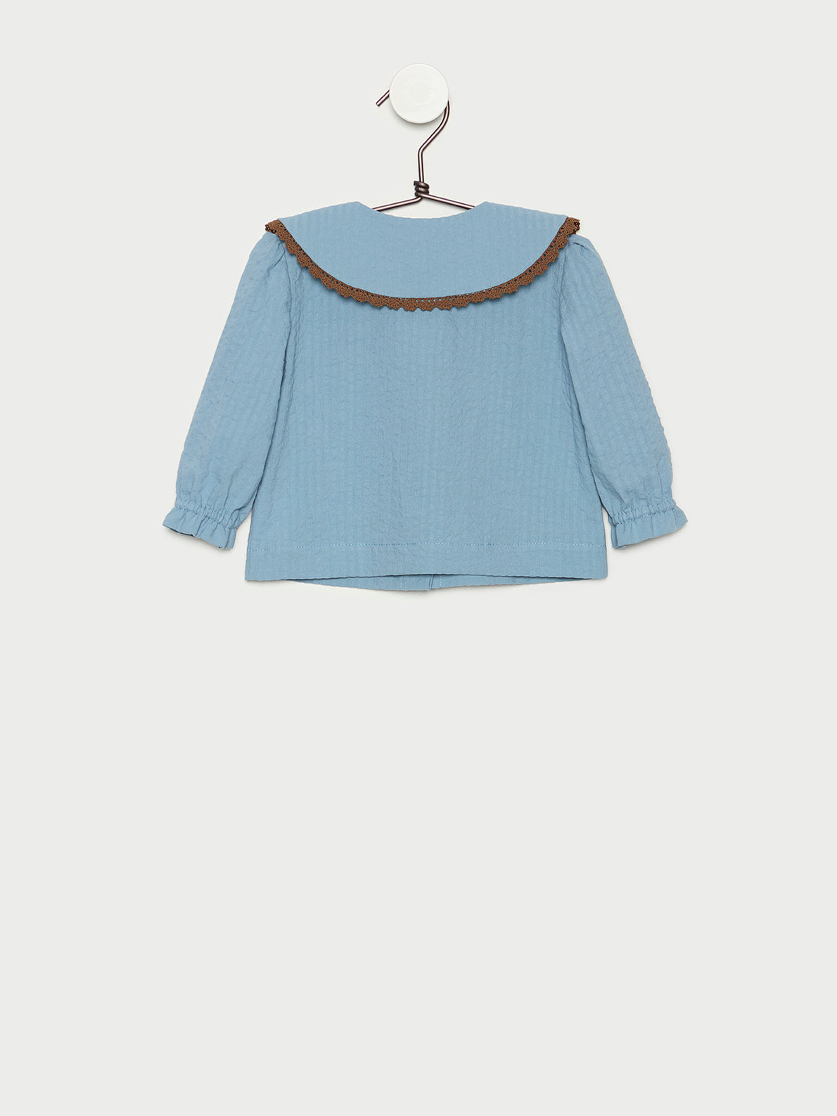 Blusa de bebé azul vista espalda en algodón 100% hecha en España